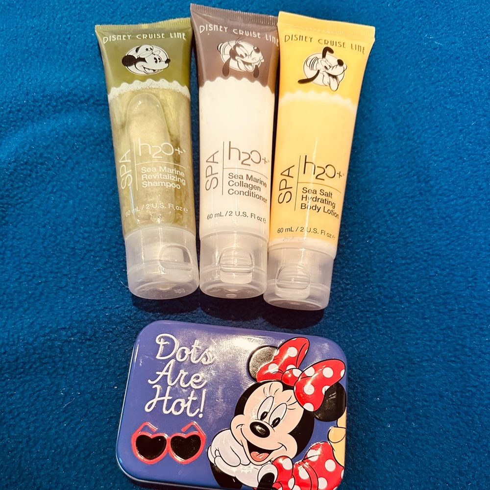 Disney Travel pack - shampoo, conditioner, body lotion and q - tip tin.